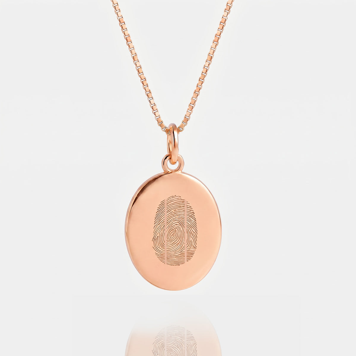 Collana ovale con tre impronte digitali